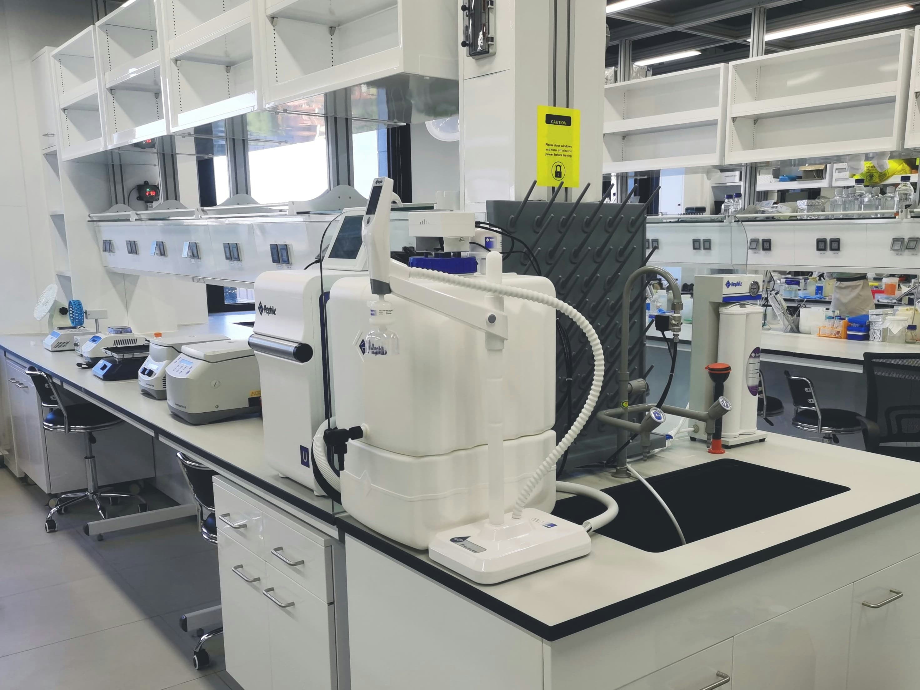 A clean modern laboratory with analytical testing equipment